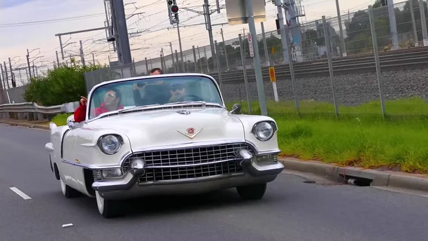 White vintage Cadillac from the Elvis promotional reel